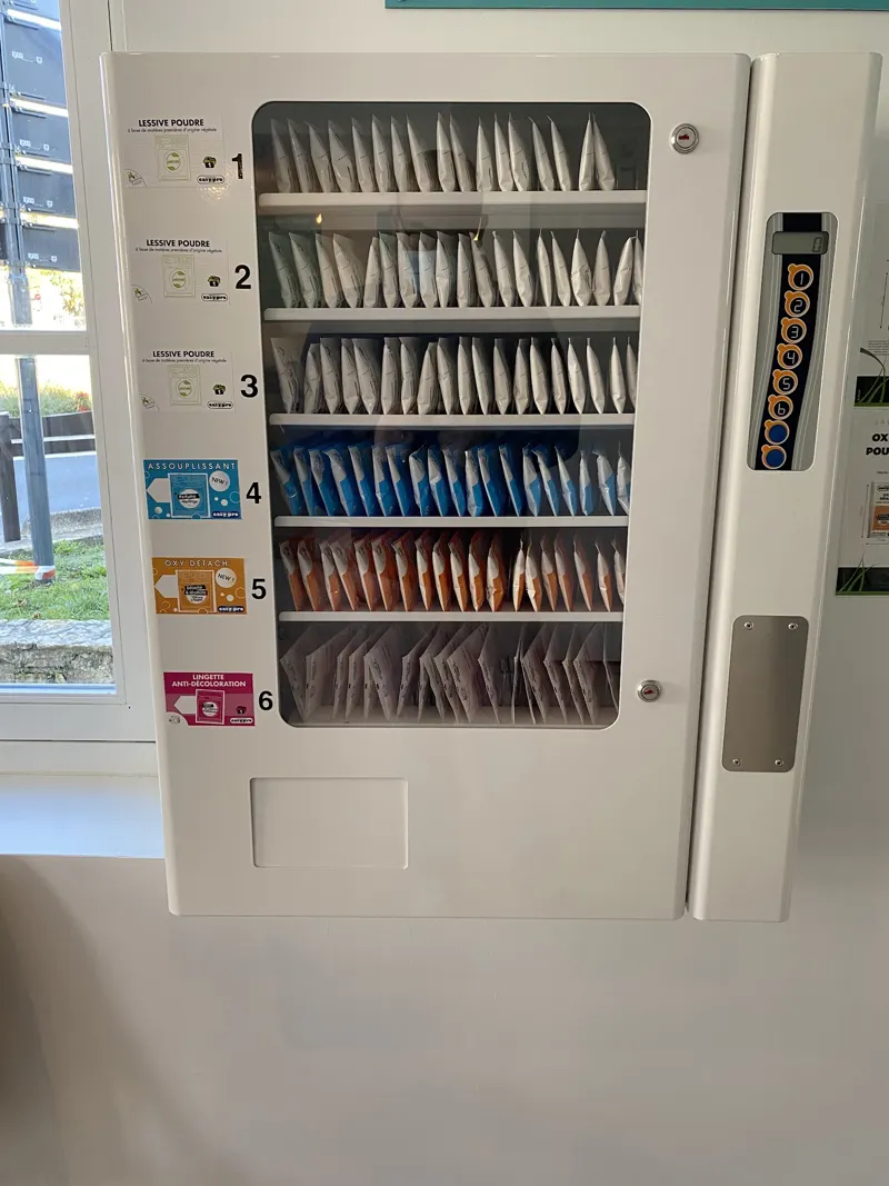 Distributeur de dosettes de lessive